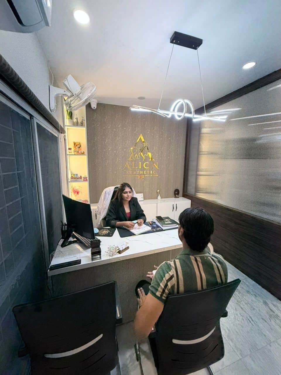 Dr. Nikita Soni in consultation at her desk