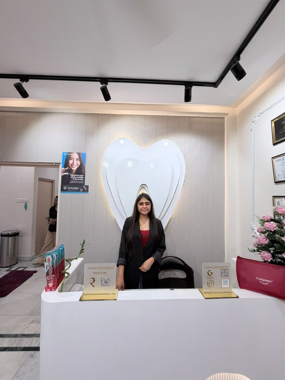 Dr. Nikita Soni at the reception desk